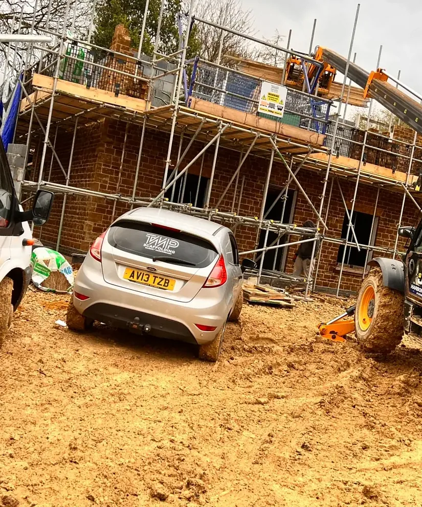 Scaffolding and plant at a building construction site
